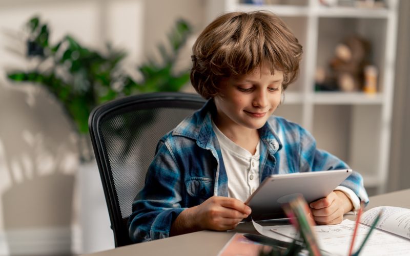 young-boy-learning-with-tablet-at-home-2026-01-06-09-50-59-utc